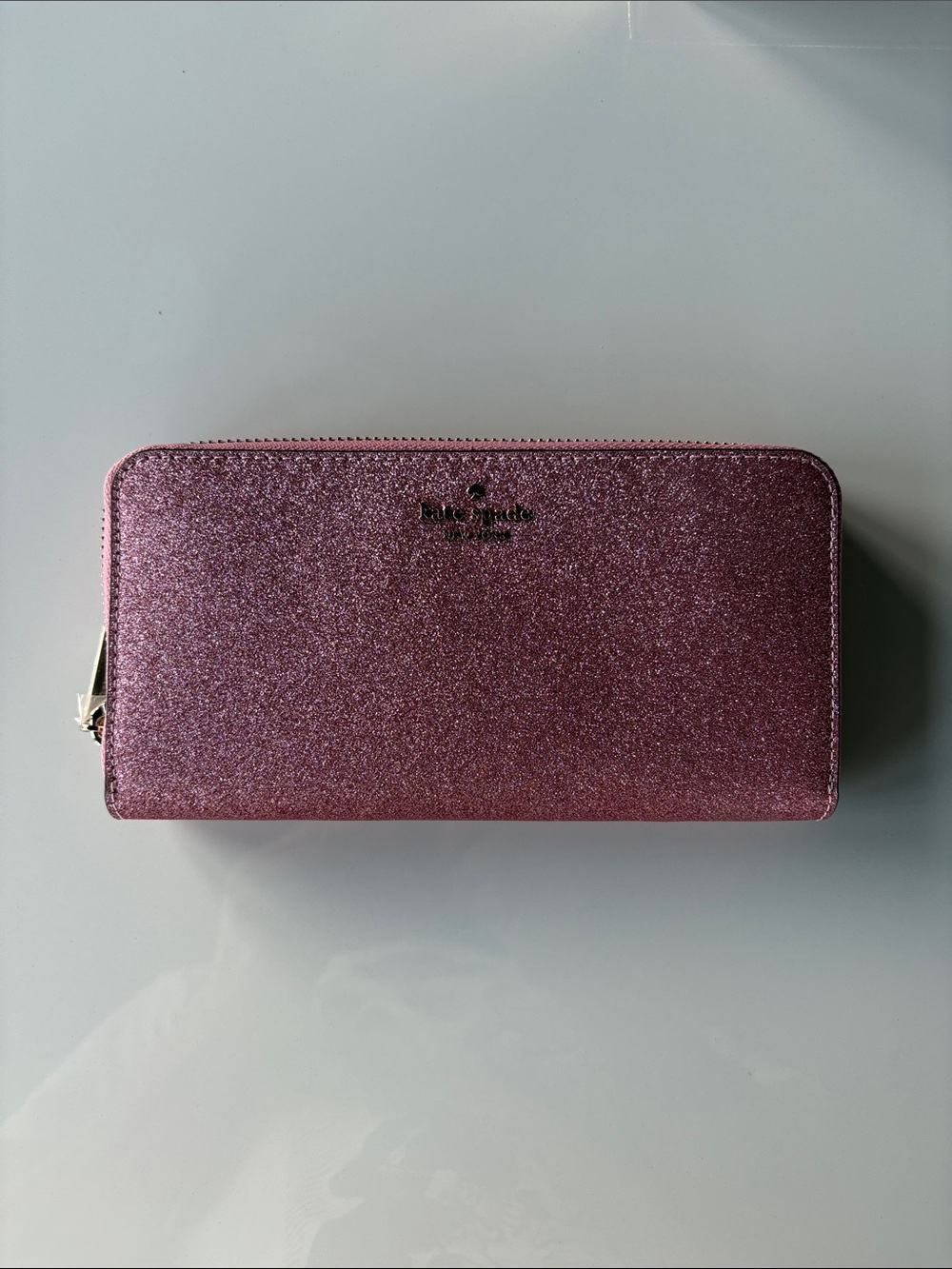 kate spade glitter zip-around wallet in rose pink